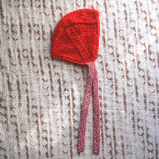 red/pink baby bonnet