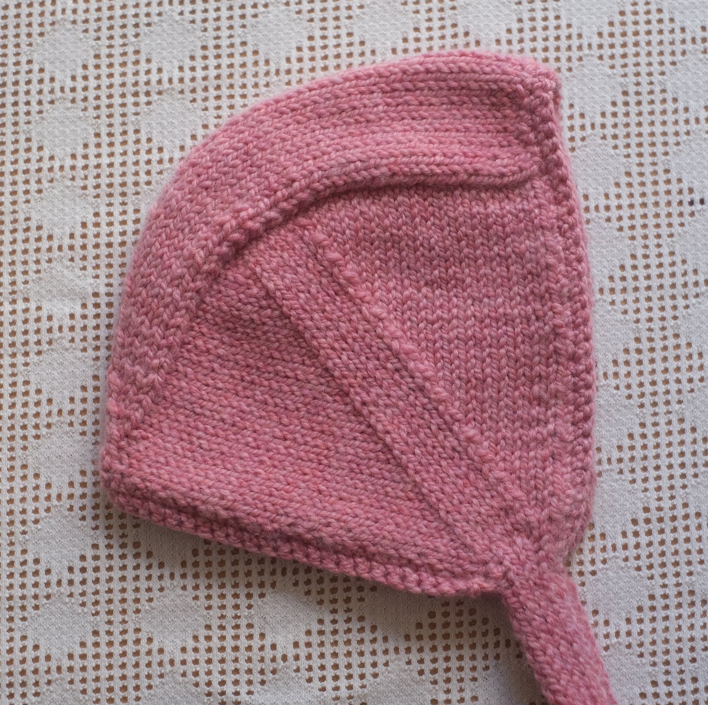 pink baby bonnet